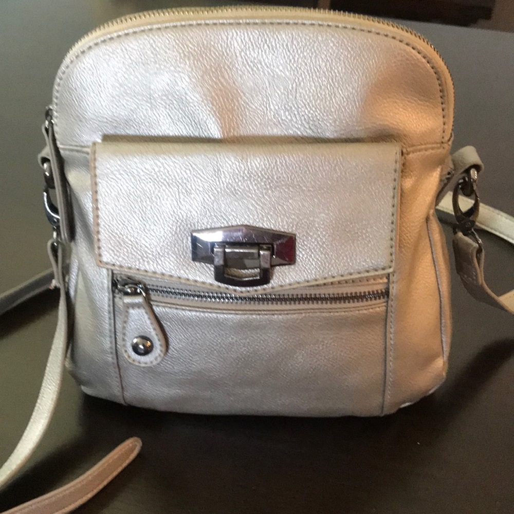 Purse in neutral color pewter. By Chico’s.